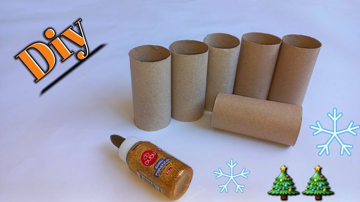 toilet paper rolls, glue and christmas tree decorations