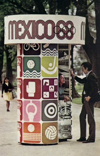 a man standing in front of a sign that says mexico 088 with many different symbols on it