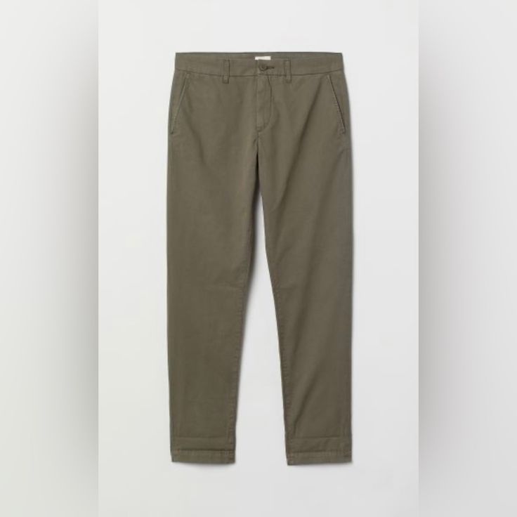 H&M Pants Slim Fit Cotton Chinos Description And Fit Chinos In Washed Cotton Twill. Zip Fly, Side Pockets And Welt Back Pockets. Slim Fit: Relaxed Over The Thighs And Tapered From The Knees Down For A Casual, Well-Tailored Look. Length: Long Fit: Slim Fit Style: Chinese Description: Green Imported Green Casual Pants For Business Casual, Green Casual Pants For Business Casual Occasion, Green Casual Bottoms For Business Casual, H&m Casual Tapered Leg Pants, Green Ankle-length Cotton Chinos, H&m Relaxed Fit Bottoms For Workwear, Casual H&m Straight Pants, H&m Casual Ankle-length Pants, H&m Casual Straight Leg Bottoms