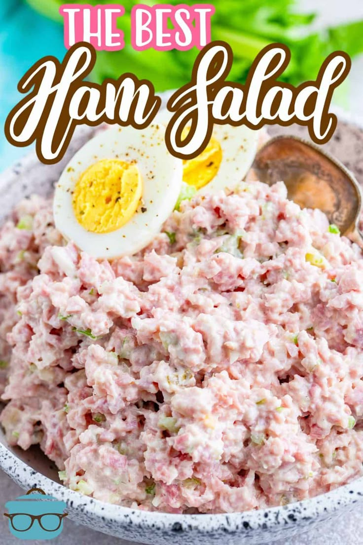 tuna salad in a bowl with an egg on top and the words, the best ham salad