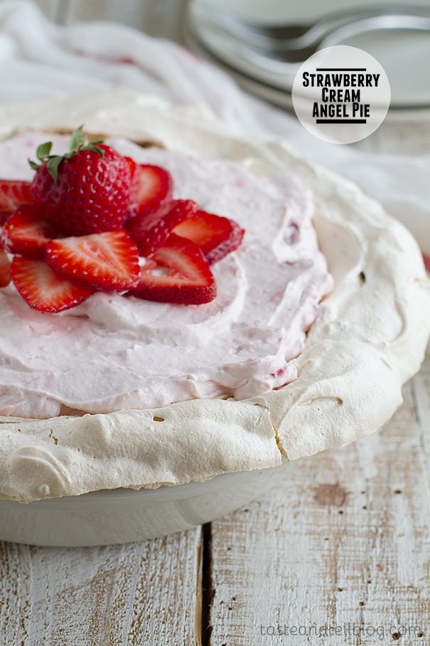 a strawberry cream pie with fresh strawberries on top