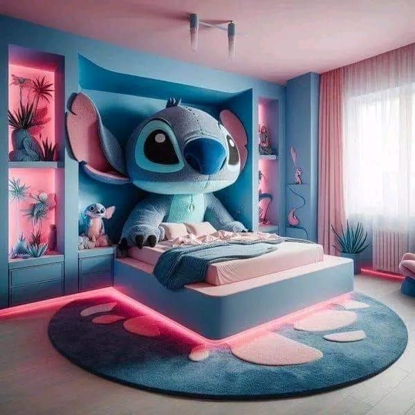 a bedroom decorated in blue and pink with an elephant bed