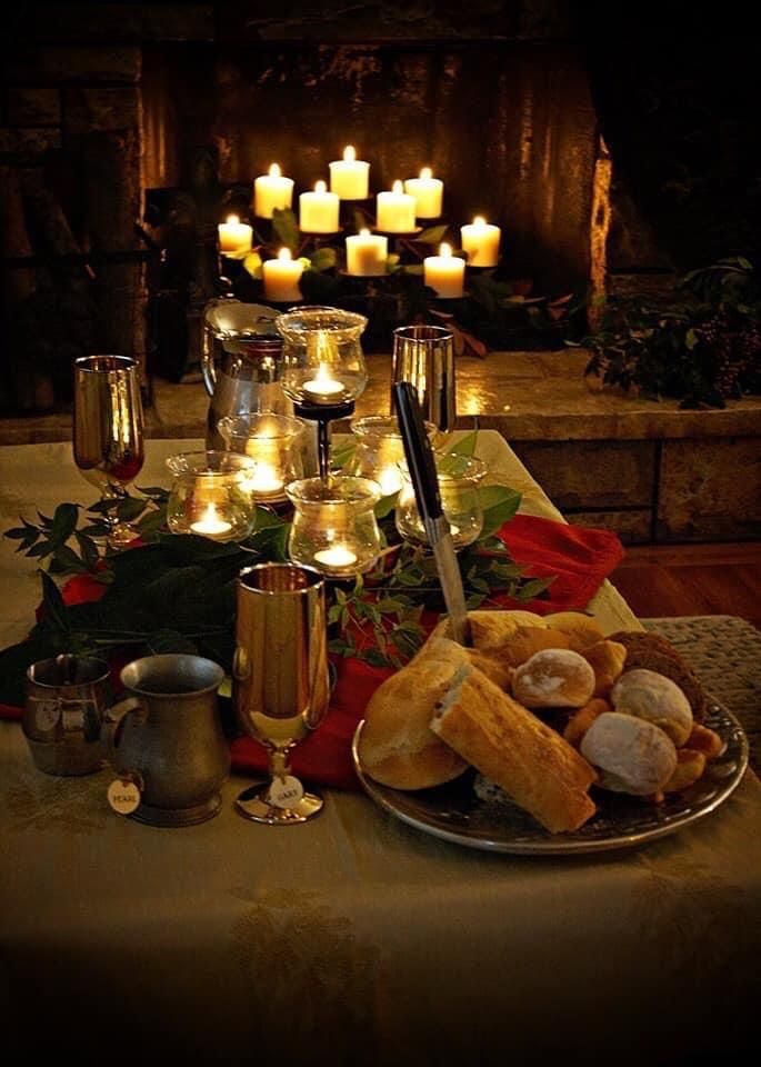 a table with candles and food on it