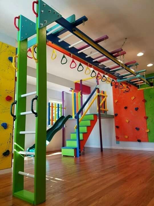 a child's play area with climbing equipment