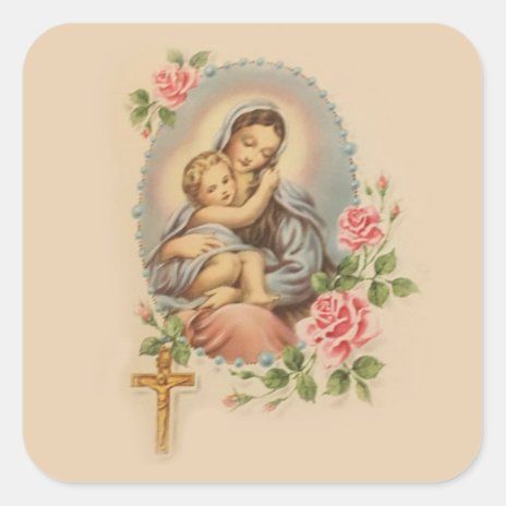 an image of the virgin mary holding a child in her arms with roses around it