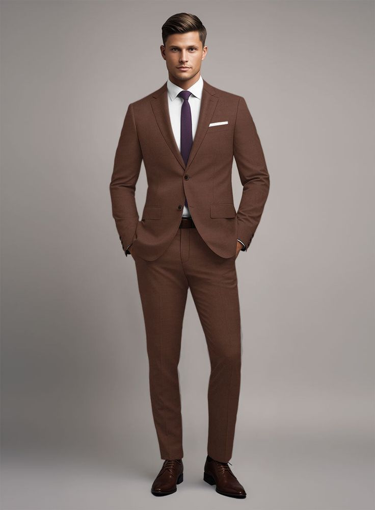 Everytime a brown suit was put to a test, it passed with flying colors. Crafted from 100% wool, our Scabal Brick Brown Wool suit is a wardrobe essential for timeless styling, which has been gently milled to give a soft superior feel. Wear this sleek suit to special occasions, whether you're headed to work or looking to add some class to your everyday outfits for years to come. Simply pair it up with a matching waistcoat, white shirt, maroon tie and black shoes to seal the ensemble.   Look Includes  Scabal Brick Brown Wool Fabric  Two Button Jacket Style  Notch Lapel  Real Horn Brown Buttons  Single Vent  Three Cuff Buttons  Two Welted Back Pockets on Trousers    You can change the look during customization if required.   Weight: Light Weight/260gr, Lining: 100% Viscose, Dry Clean. Brown Suit Ideas For Men, Luxury Brown Classic Suit And Tie Accessories, Brown Tie Outfit Men, Brown Suit Black Shirt, Tailored Brown Suit With Long Sleeves, Brown Wool Suits With Suit Collar, Tailored Brown Blazer, Timeless Brown Notch Lapel Suit, Timeless Brown Business Suit