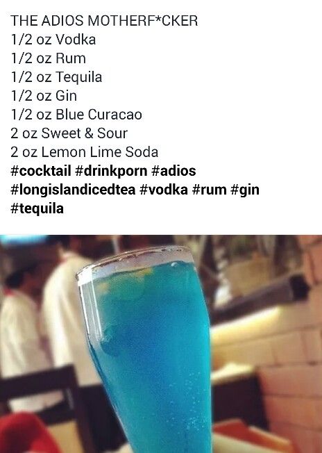 a blue drink sitting on top of a table