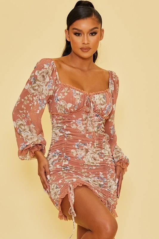 A woven mini dress featuring an allover floral print with lace trim accents, long peasant sleeves, a sweetheart neckline, smocked back with zipper, ruched drawstring front, and a bodycon silhouette. -Shell: 100% Polyester - Lining: 100% Polyester - Hand wash cold - Imported Fitted Long Sleeve Mini Dress With Smocked Back, Spring Mini Dress With Smocked Back And Sweetheart Neckline, Feminine Long Sleeve Mini Dress With Smocked Bodice, Summer Long Sleeve Mini Dress With Smocked Bodice, Spring Long Sleeve Mini Dress With Smocked Bodice, Spring Mini Dress With Smocked Bodice And Long Sleeves, Flowy Ruched Mini Dress For Spring, Spring Long Sleeve Dress With Ruched Bodice, Fitted Mini Dress With Smocked Bodice And Long Sleeves