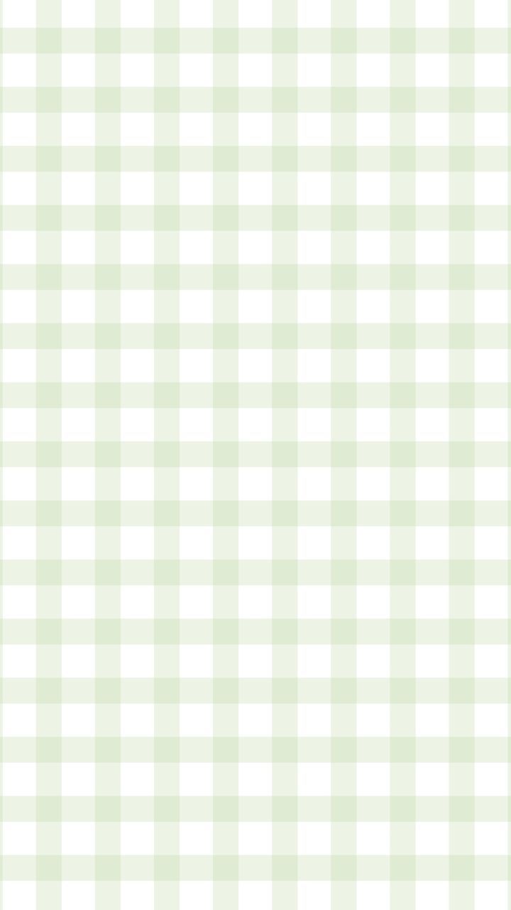 a green and white checkered background with small squares on the bottom right hand corner