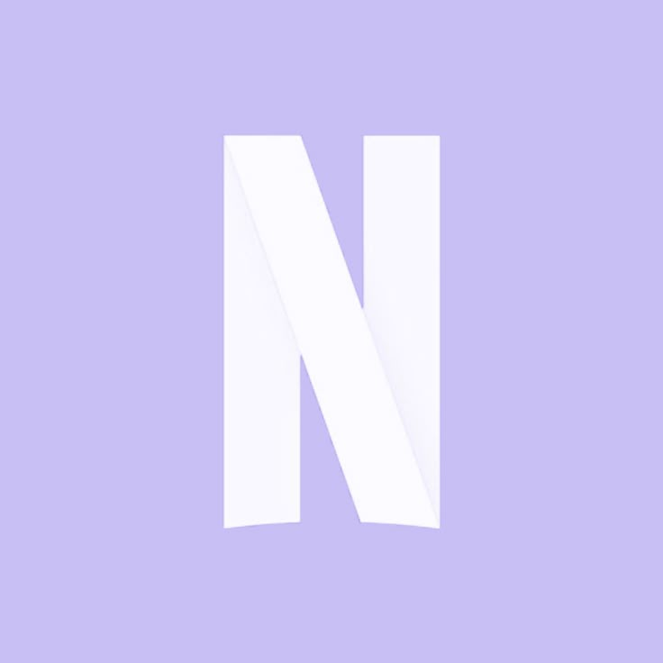 the letter n is made up of white paper on a light purple background with an angled corner