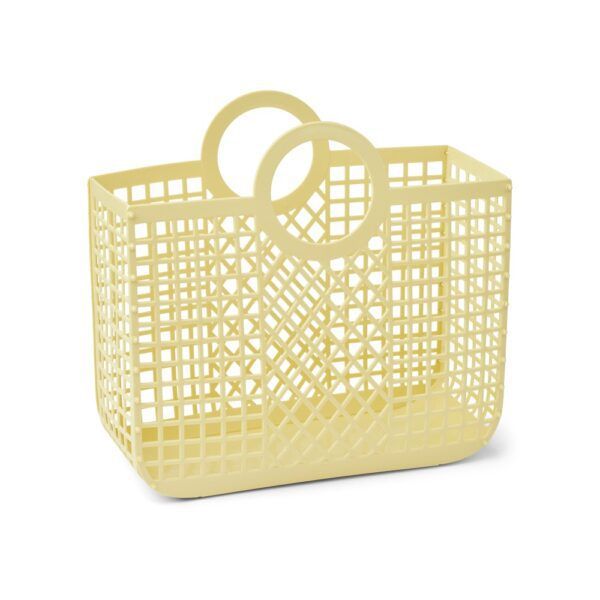 a yellow plastic basket with two rings on the handle and one ring in the middle