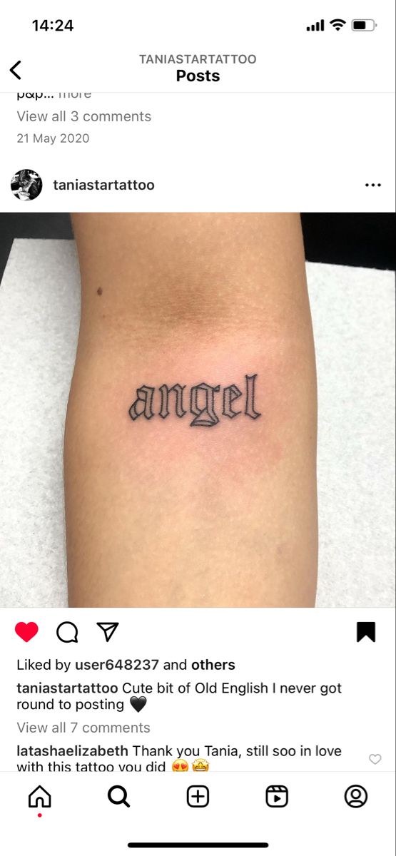 an arm tattoo with the word angel tattooed on it's left side ribcage