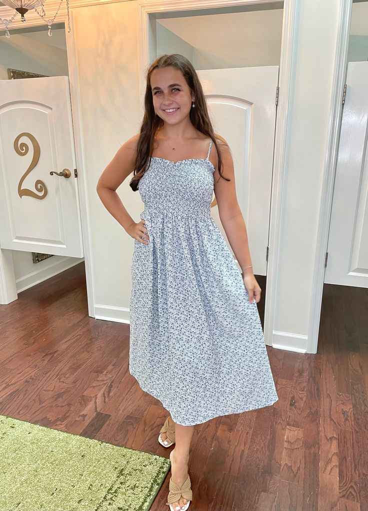 Embrace sweet summertime vibes with the Aiden Dress! This printed midi sun dress features a smocked detail that hugs your curves, plus adjustable straps for the perfect fit. Made of 100% polyester, this dress is both comfortable and stylish. Perfect for picnics, beach days, or any sunny adventure! Sizing: runs true to size; size chart included in the photos Summertime Vibes, Casual Chic Spring, Sweet Summertime, Jumpsuit Shorts Rompers, Sun Dress, Short Jumpsuit, Beach Days, Shoes Booties, Sweatshirt Dress