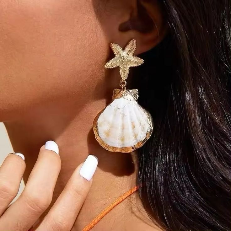 Starfish Shell Drop Earrings Elegant Star-shaped Summer Earrings, Star Shaped Earrings For Summer, White Starfish Charm Earrings For Gift, White Starfish Charm Earrings As Gift, White Starfish Charm Earrings, White Star Earrings For Beach, White Star-shaped Earrings With Starfish Charm, White Starfish Charm Star Earrings, Elegant Star-shaped Earrings For Summer