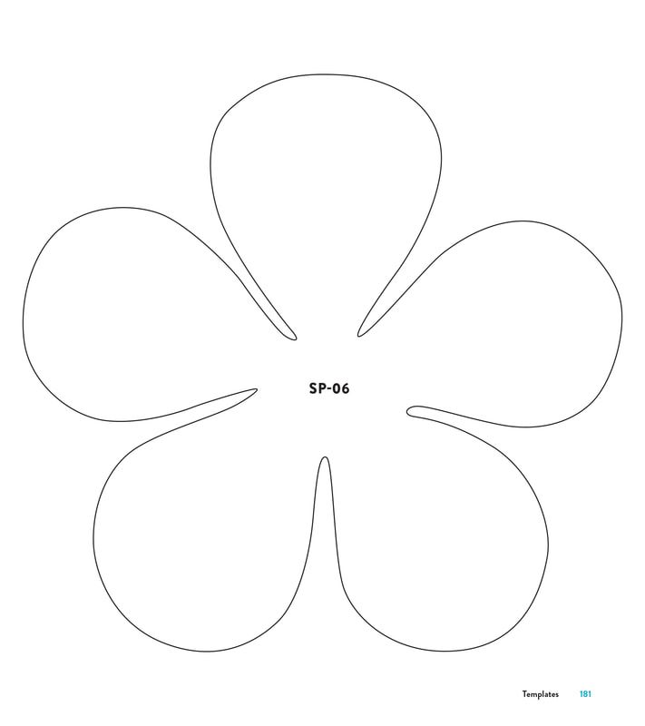 a four leaf clover cut out into the shape of a flower