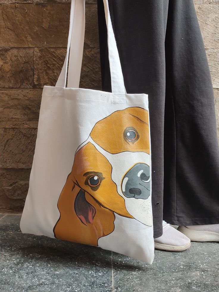 a person standing next to a bag with a dog on it