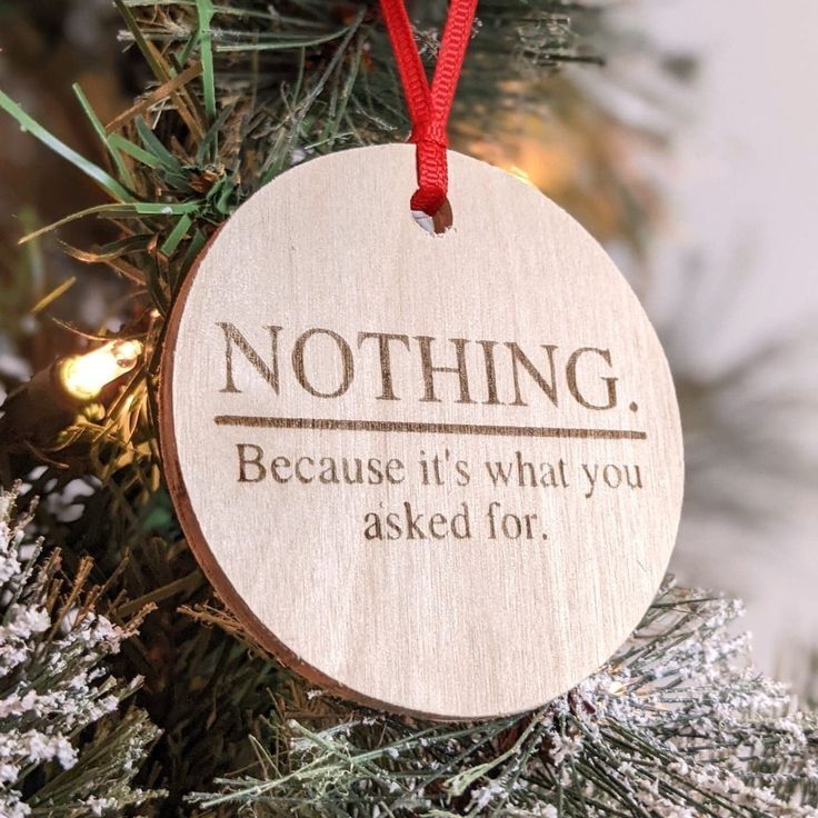 a wooden ornament that says nothing because it's what you asked for