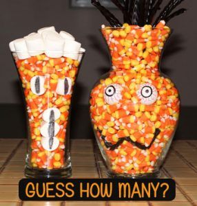 two vases that have candy in them and one has a face painted on it