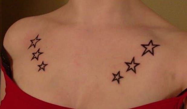 a woman wearing a red top with stars on her chest