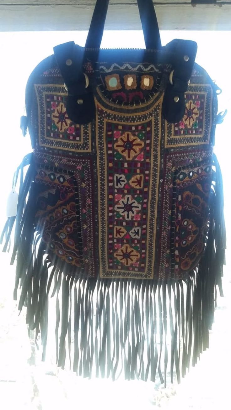 Festival Multicolor Embroidered Bags With Tassels, Black Bohemian Shoulder Bag With Tassels, Festival Bags With Multicolor Embroidery And Tassels, Bohemian Hand-stitched Tote Shoulder Bag, Bohemian Hand-stitched Bags, Multicolor Embroidered Rectangular Shoulder Bag With Tassels, Embroidered Rectangular Hobo Bag For Festivals, Bohemian Satchel Bag With Tassels, Bohemian Satchel With Tassels