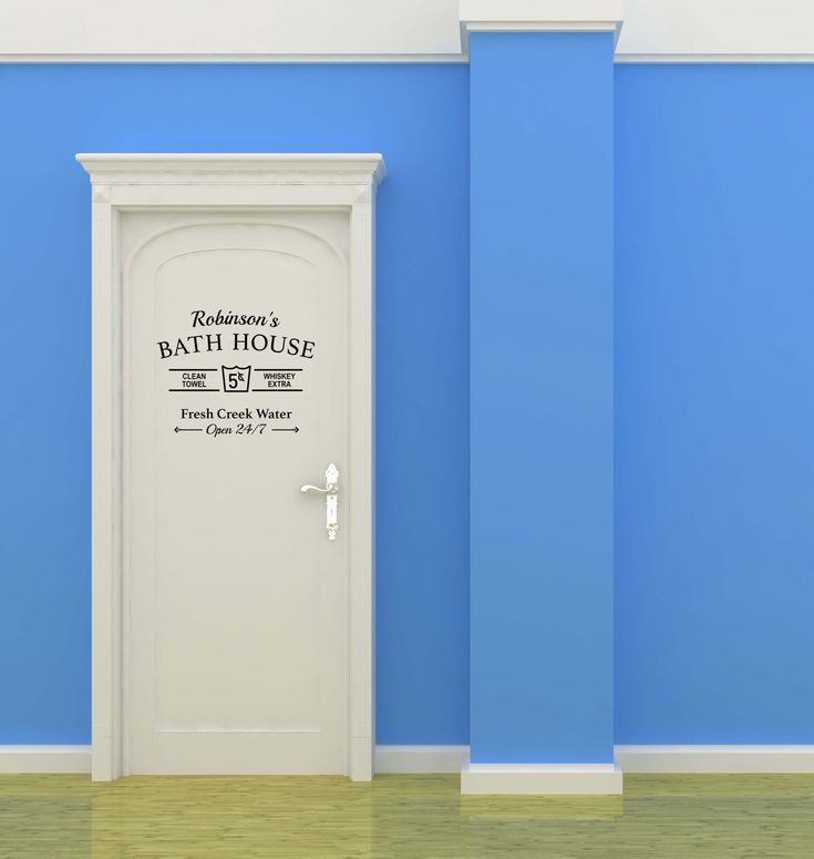 an open door in a blue room with the words bath house on it's side