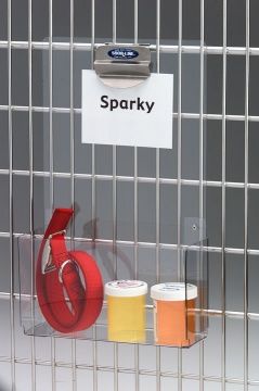 there is a sign that says sparky on the side of a glass case with some drinks in it