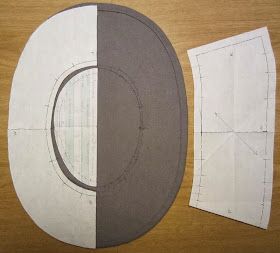 the paper is cut out and ready to be sewn into something else that looks like an oval