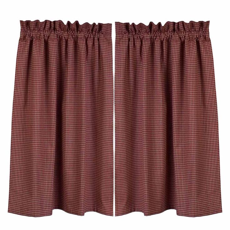 two red and white checkered curtains hanging on the side of a curtain roddle