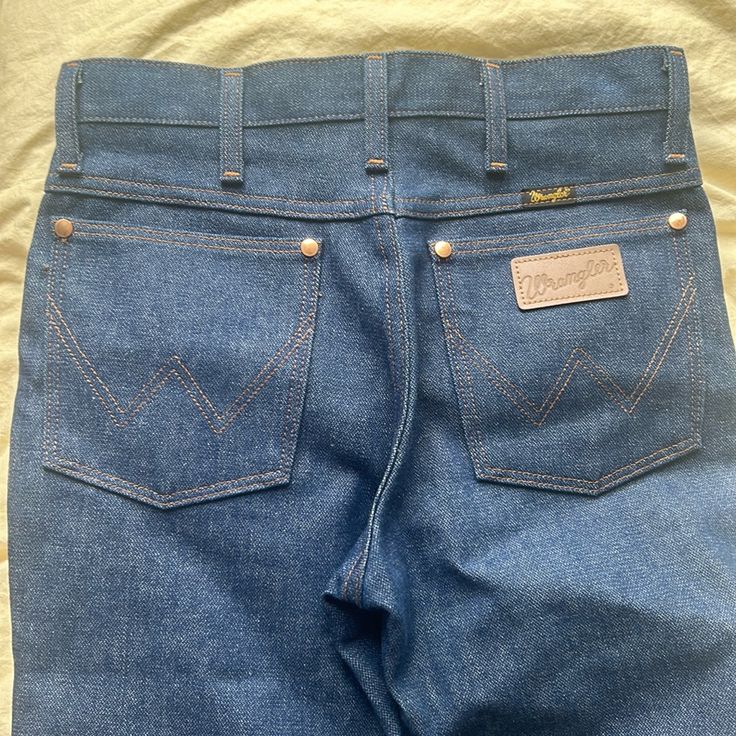 These Are Brand New Wrangler Jeans, Selling Because They Don’t Fit! It Says 28 But They Fit More Like A 26/27 Waist Denim Blue Straight Leg Bottoms For Rodeo, Dark Wash Cotton Bottoms For Rodeo, Western Style Denim Blue Cotton Bottoms, Blue Denim Western Bottoms, Western Style Blue Denim Bottoms, Blue Mid-rise Bottoms For Rodeo, Blue Cotton Jeans For Rodeo, Fitted Blue Jeans For Rodeo, Vintage Straight Leg Rodeo Bottoms