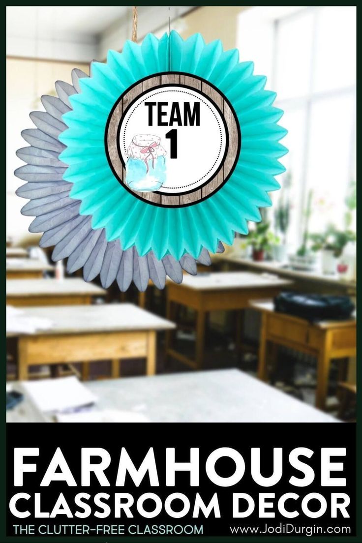 an image of a classroom decoration with the name team 1 hanging from it's center