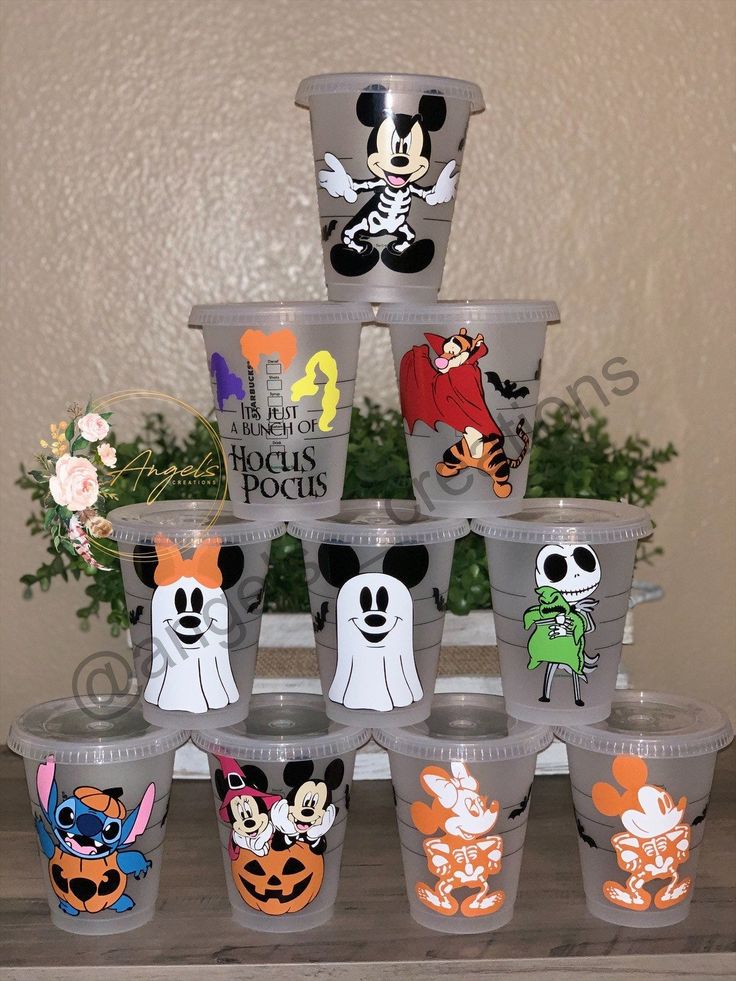 plastic cups decorated with mickey mouse and friends