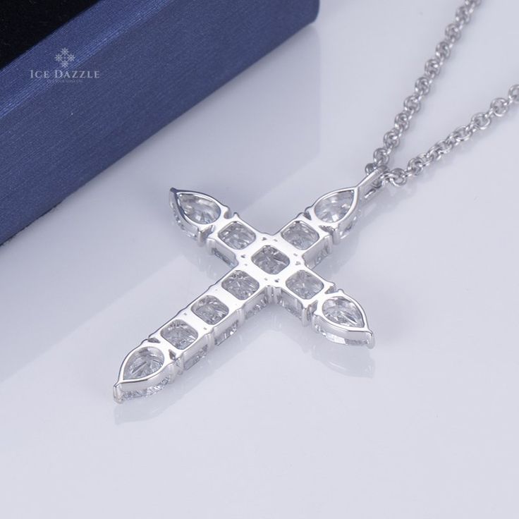 This luxurious Lab Grown Diamond Fancy Cut Cross Necklace in 14K White Gold will make a statement. Its impressive design and stunning craftsmanship combine to create a piece of jewelry that is truly one-of-a-kind. Diamond White Cross Necklace Fine Jewelry, White Brilliant Cut Cross Necklace Gift, Gift White Brilliant Cut Cross Necklace, White Cross Necklace With Brilliant Cut As Gift, Gift-ready White Brilliant Cut Cross Necklace, White Gold Cross Necklace With Diamond Cut Cubic Zirconia, White Gold Cubic Zirconia Crucifix Necklace, White Gold Cubic Zirconia Cross Necklace With Diamond Cut, White Gold Crucifix Necklace With Cubic Zirconia