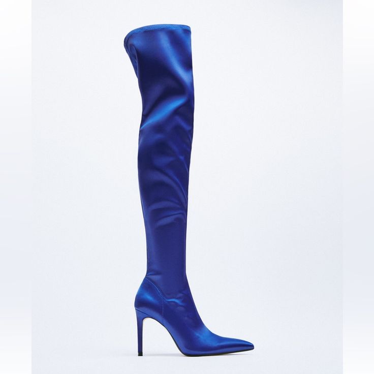 Electric Blue Thigh High Boots With Heel. Formal Fitted Blue Boots, Elegant Blue Formal Heeled Boots, Elegant Blue Heeled Boots For Formal Occasions, Blue High Heel Boots For Evening, Elegant Blue Spring Boots, Elegant Blue Heeled Boots For Fall, Elegant Blue Heeled Boots For Evening, Blue Thigh High Party Boots, Blue Heeled Boots For Winter Party