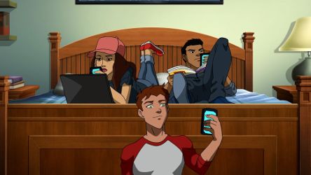 three people sitting on a bed with their laptops and cell phones in front of them