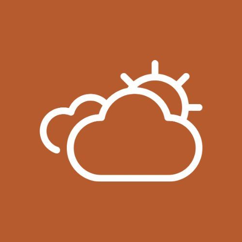 an orange background with a white cloud and sun in the sky on top of it