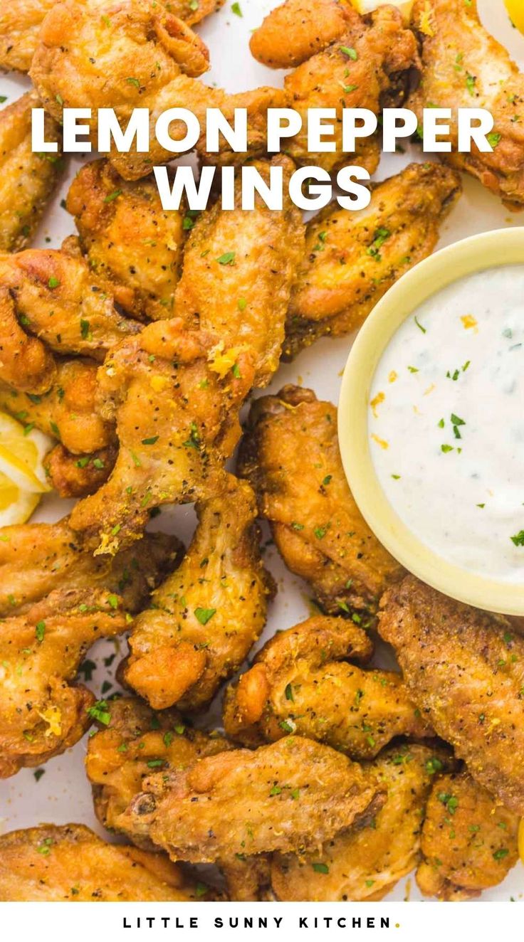 lemon pepper wings with dipping sauce on the side