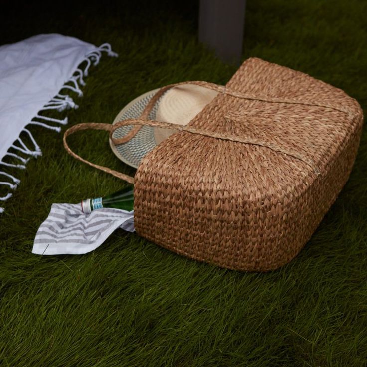 With long handles and a sturdy base, the Lagom Bag is woven from seagrass and manages to be practical, roomy, and stylish all at once. Perfect for carrying your flowers home from market or your towel and favorite book to the beach. 19.5in W x 7in D x 11.5in H Finish: Tan Material: Seagrass Made in Vietnam Shop more Hype Decor Rectangular Straw Bag With Bamboo Handle For Picnic, Natural Straw Bag With Bamboo Handle For Picnic, Rectangular Straw Beach Bag For Picnic, Large Capacity Rattan Basket Beach Bag, Picnic Straw Bag With Bamboo Handle In Natural Color, Casual Natural Fiber Bag For Picnic, Rattan Tote Bag For Picnic, Rattan Tote Bag For Picnics, Jute Beach Bag With Bamboo Handle In Basket Shape