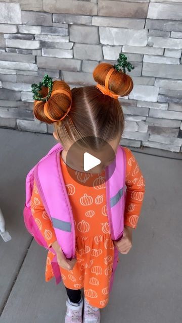 Tiffany Snedaker ❤️ Hairstyles for Girls on Instagram: "Crazy hair day at school! I asked Rosie if she wanted to do pumpkin buns and she was all on board. Last night we ran to Walmart to get some pipe cleaners and orange ribbon. I happened to see orange hair spray so we picked some of that up while we were there. This would also be equally as cute without the orange hair spray. She absolutely loved the finished look. She looks festive for fall and it was perfect for crazy hair day!" Crazy Hair And Sock Day At School, Pumpkin Pipe Cleaner Hair, Halloween Pumpkin Hair Bun, Pumpkin Hair Styles, Pumpkin Crazy Hair Day, Boo Buns Hair, Teacher Crazy Hair Day At School, Pumpkin Bun Hairstyle, Fall Crazy Hair Day