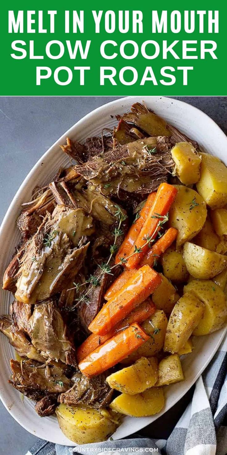 a white plate topped with meat and potatoes