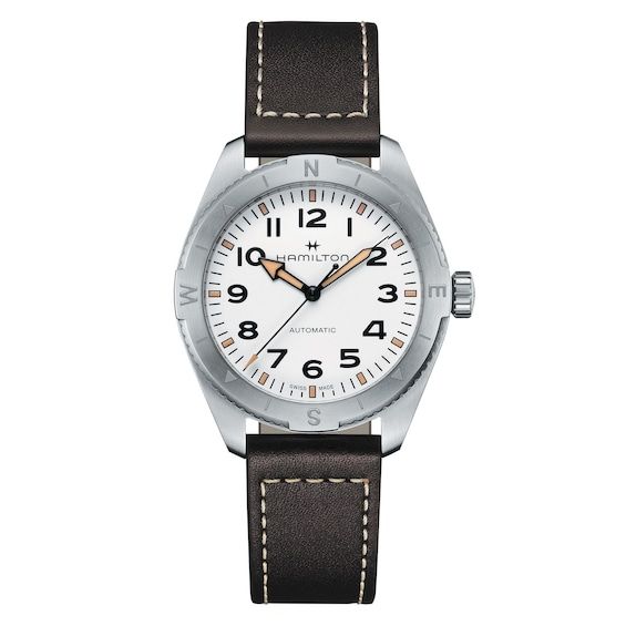 This versatile men's watch from the Khaki Field collection by Hamilton is built for time-tested endurance. 41mm stainless steel case White dial Sapphire crystal Automatic movement The brown leather strap secures with a buckle clasp Water-resistant to 100m White Watches For Men, Adventure Watches, Hamilton Khaki Field, Timepiece Design, Hamilton Khaki, Brown Leather Strap Watch, Hamilton Watch, Field Watches, Compass Design