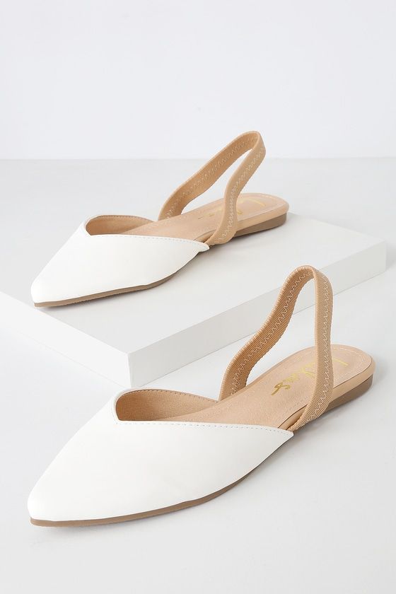 Lulus Exclusive! Step into style with the Lulus Mae White and Nude Pointed-Toe Slingback Flats! These vegan leather cuties are the perfect blend of chic and sensible with their low-maintenance flat sole, comfortable nude elastic slingback, and cute notched pointed-toe upper. 0. 25" rubber heel. Cushioned insole. Rubber sole has nonskid markings. All vegan friendly, man made materials. Imported. Lulus | Mae White and Nude Pointed-Toe Slingback Flats | Size 9 | Vegan Friendly. Cute Flat Sandals, Pretty Sandals, Strappy Sandals Flat, Strappy Flats, Cute Flats, Slingback Flats, Studded Heels, Pointed Toe Flats, White Flats