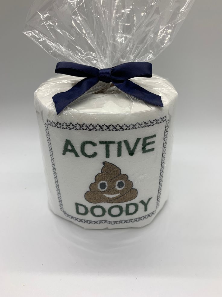 an active doody toilet paper roll wrapped in plastic