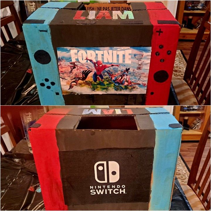 two cardboard boxes that have been made to look like video games