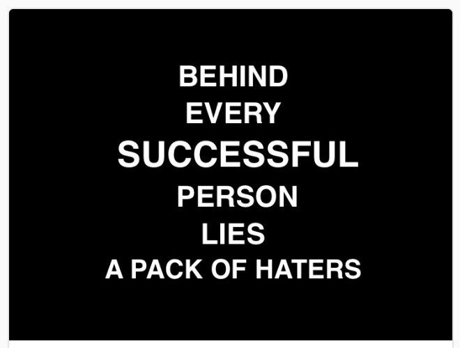 a black and white poster with the words behind every successful person lies a pack of haters