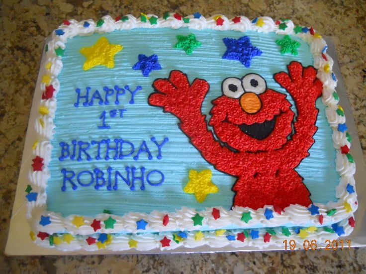 a birthday cake with an elmo character on it