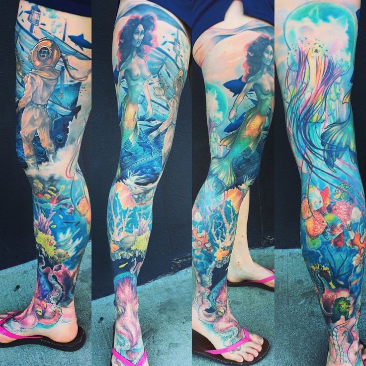 the legs are covered with colorful tattoos on them, and there is no image here to provide a caption for