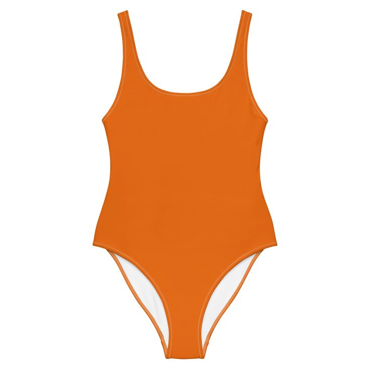 Flattering design, smooth fabric. Perfect for all body types. Elevate your curves with this color match one piece swimsuit. Color Match: perfect for all, look’s especially great on skin tone types IV-VIFind Your Tone• 82% Polyester, 18% Spandex• Fabric weight: 6.78 oz/yd² (230 g/m²), weight may vary by 5%• Chlorine-resistant fabric• Cheeky fit with a scoop neckline and a low scoop back• Zig-zag stitching• Double-layer front • Four-way stretch material stretches and recovers on the cross and leng Solid One-piece Smoothing Leotard, Smoothing One-piece Leotard, Stretch Orange One-piece For Pool, Solid One-piece Leotard For Sports, Orange Sporty Swimwear For Pool, Solid Color One-piece Sports Leotard, Solid One-piece Sports Leotard, Sporty Solid Color One-piece Bodysuit, Sporty Solid Contoured Swimwear