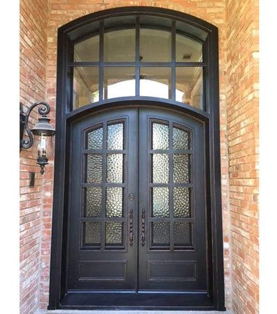 a black double door with glass panels