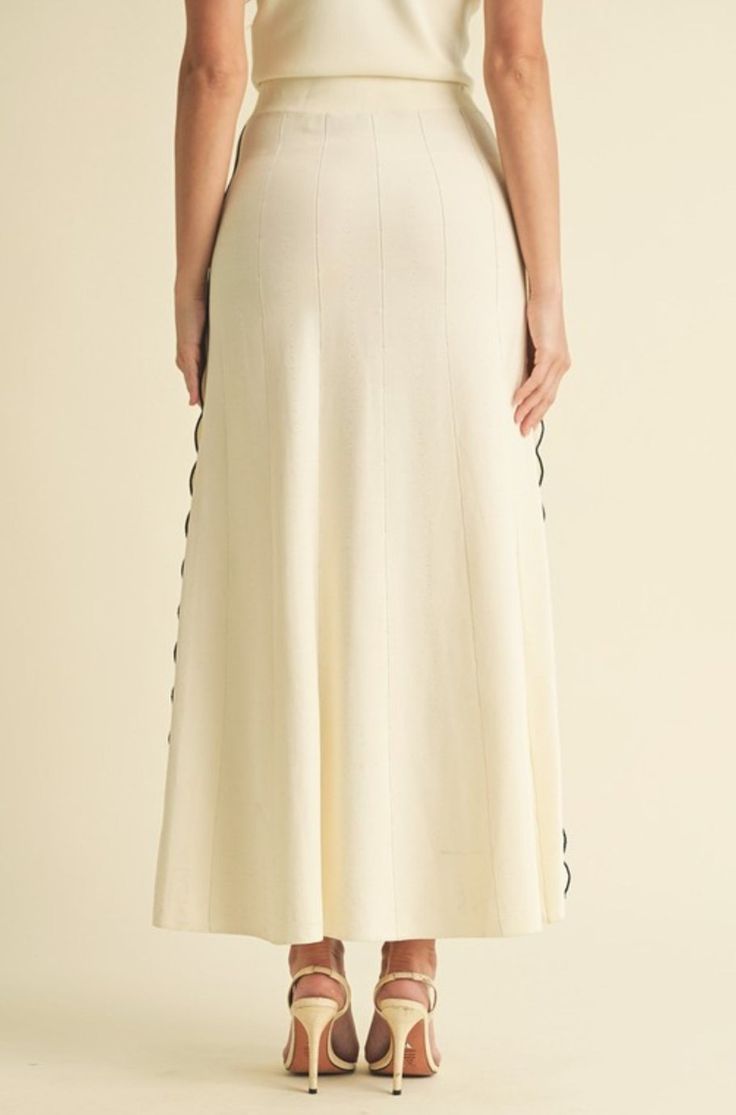 Transform your wardrobe with the Tory Pleated Skirt. This stunning white maxi skirt boasts a scalloped edge on the pleats and a banded waist, exuding pure elegance and luxury. Elevate your style with this timeless piece that promises to make you feel effortlessly chic. White Maxi Skirt, White Maxi Skirts, Pure Elegance, White Maxi, Denim Jumpsuit, Scalloped Edge, White Skirts, Barbie Fashion, Jeans Dress