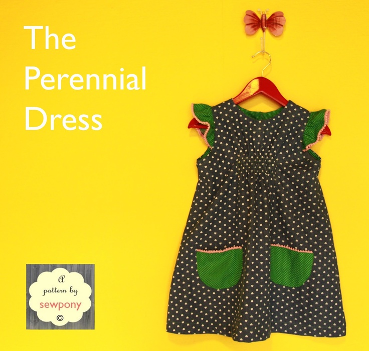 a dress hanging on a yellow wall with the words, the perennial dress